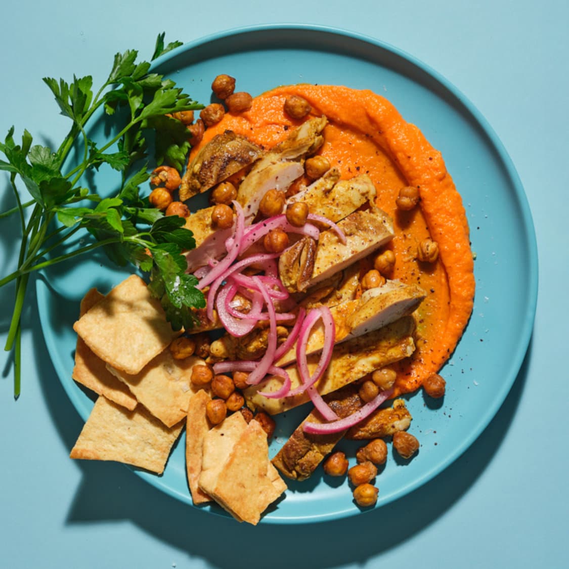 https://fleishigs.com/images/mobile-app/recipes/3250-list-spiced-pargiyot-with-carrot-ginger-puree-and-toasted-chickpea-crumble.jpg